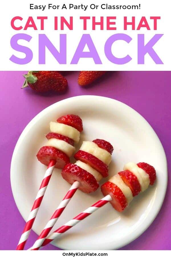 Three strawberry banana snacks that look like the cat in the hat\'s hat on a plate with text title overlay.