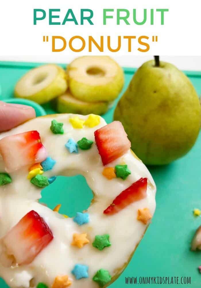 A pear decorated with fruit and sprinkles to look like a donut with text title overlay