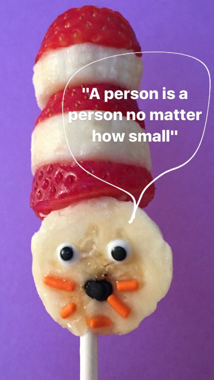 Strawberry and banana stacked to look like the cat in the hat with text overlay of a Dr. Seuss quote.