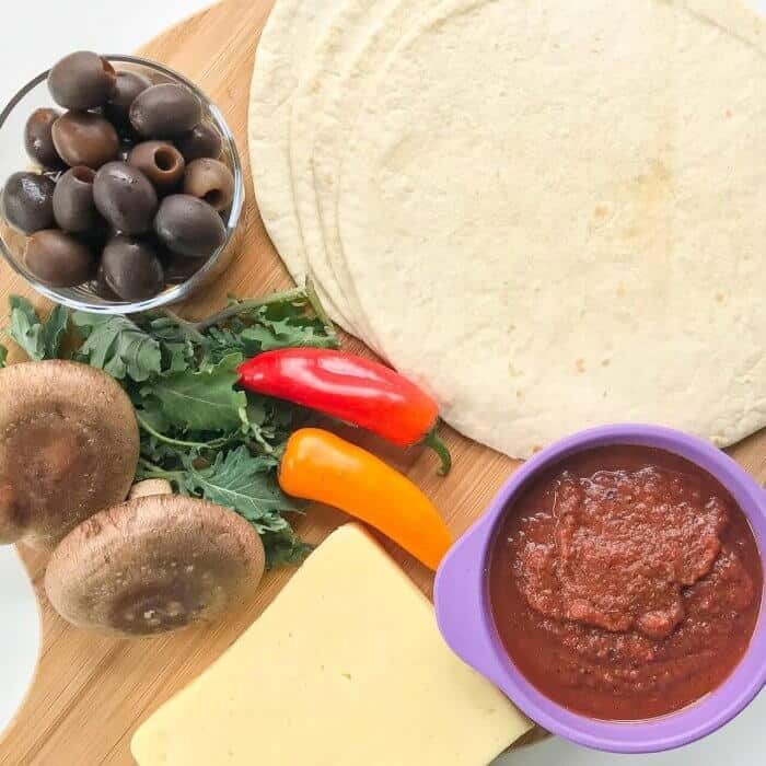 Ingredients on a pizza paddle