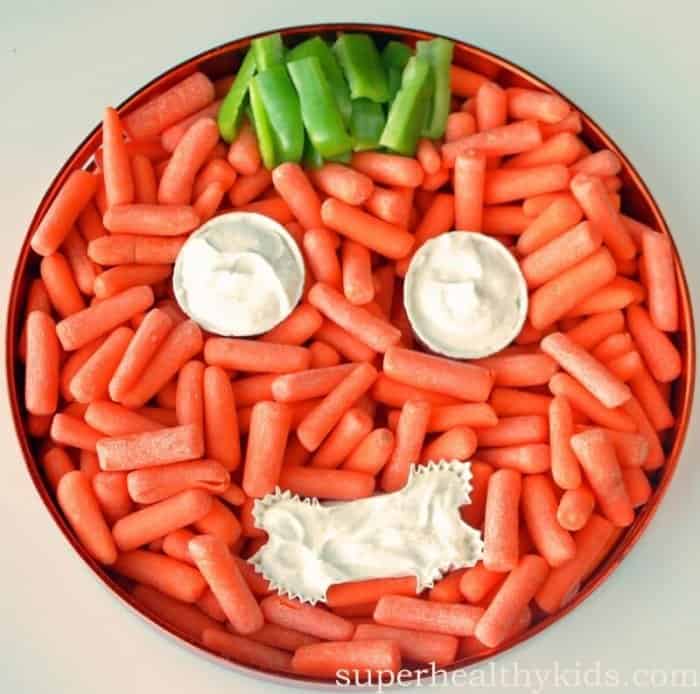 Carrot veggie tray made to look like a pumpkin