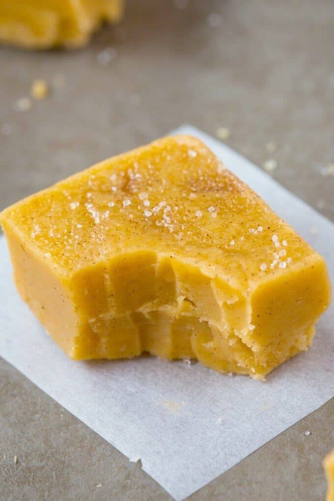 square of pumpkin fudge with a bite taken out of it