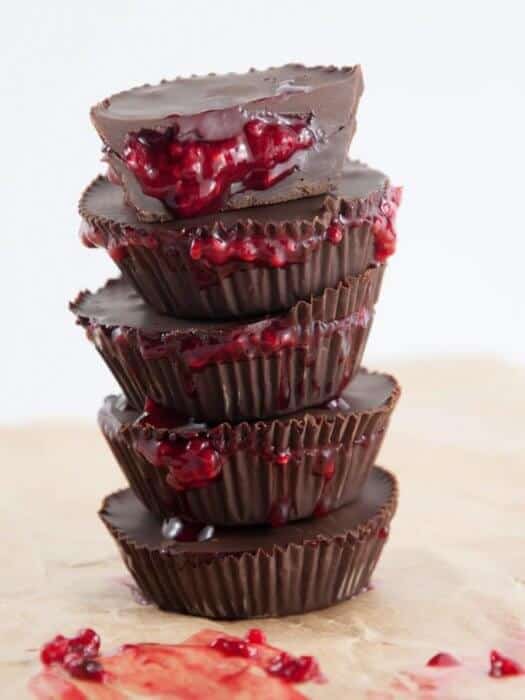 chocolate cups with jam seeping out