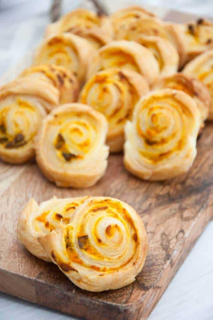 cooked pinwheel sandwiches with orange inside