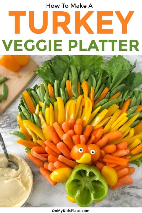 A close up of a turkey-shaped vegetable platter with text title overlay