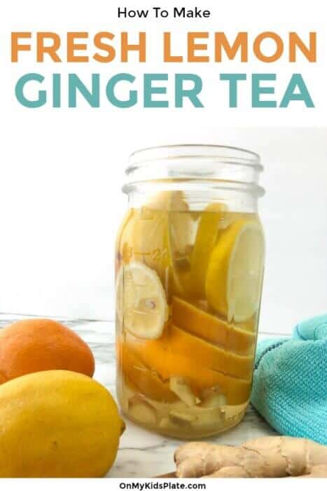 Lemon, orange and ginger slices in liquid in a mason jar with text title overlay