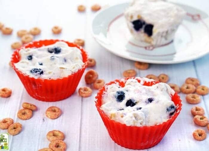 Yogurt frozen in silicone muffin liners topped with fruit and cereal
