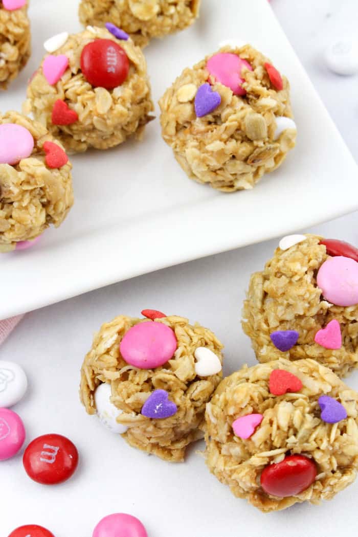 Snack bites decorated with candies and sprinkles in Valentine\'s Day colors