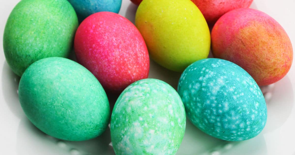 Colorful speckled easter eggs up close