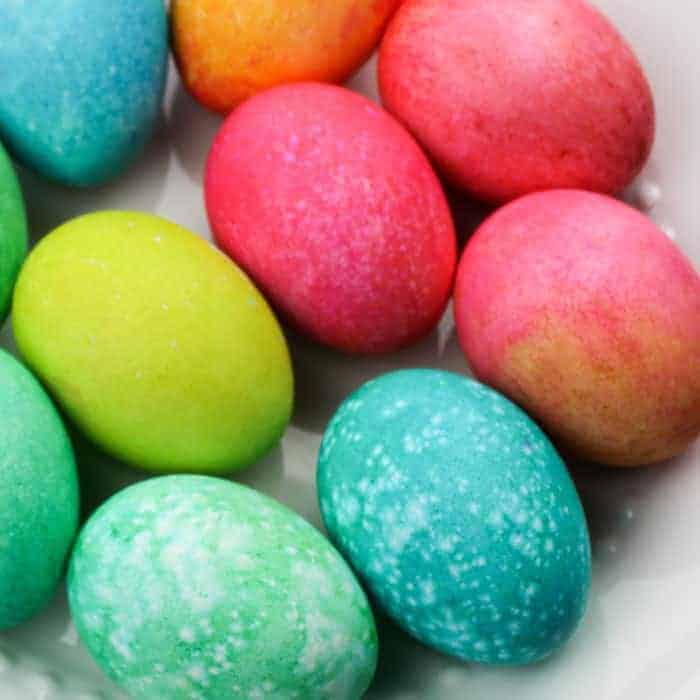 A pile of colorful easter eggs