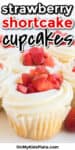 A vanilla cupcake frosted and topped with fresh diced strawberries with title text on the top of the image.