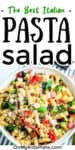 Close up of italian pasta salad in a bowl with text title overlay