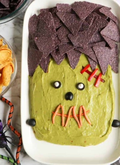 Close up of guacamole platter decorated like the monster Frankenstein