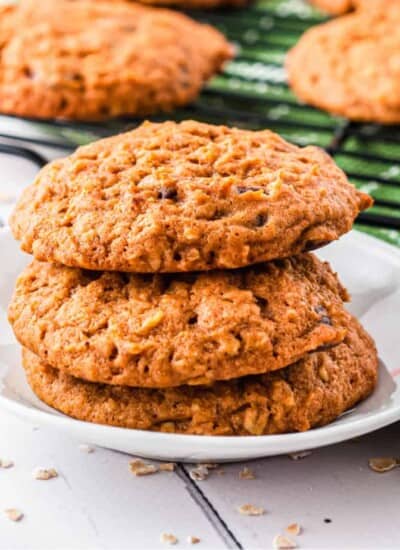 Stacked pumpkin oatmeal cookies on a plate