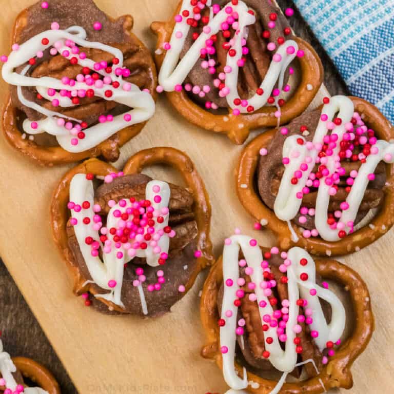 Close up of rolo pretzel chocolates decorated with sprinkles