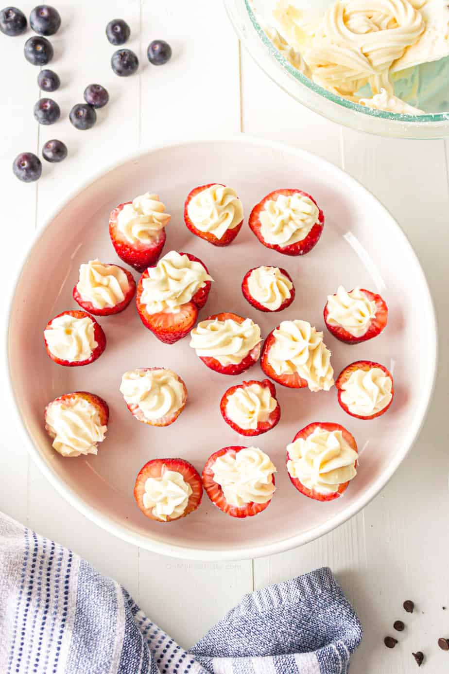 Place full of strawberries facing upwards filled with cream cheese