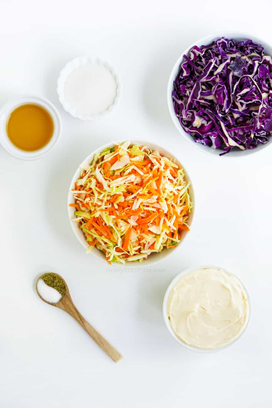 Ingredients for coleslaw from overhead in bowls