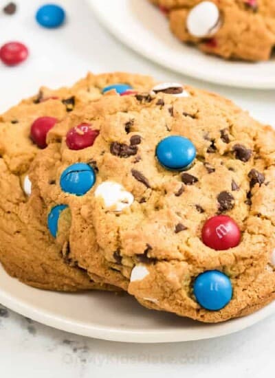 Cookies on a plate with red white and blue M&Ms