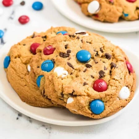 Cookies on a plate with red white and blue M&Ms