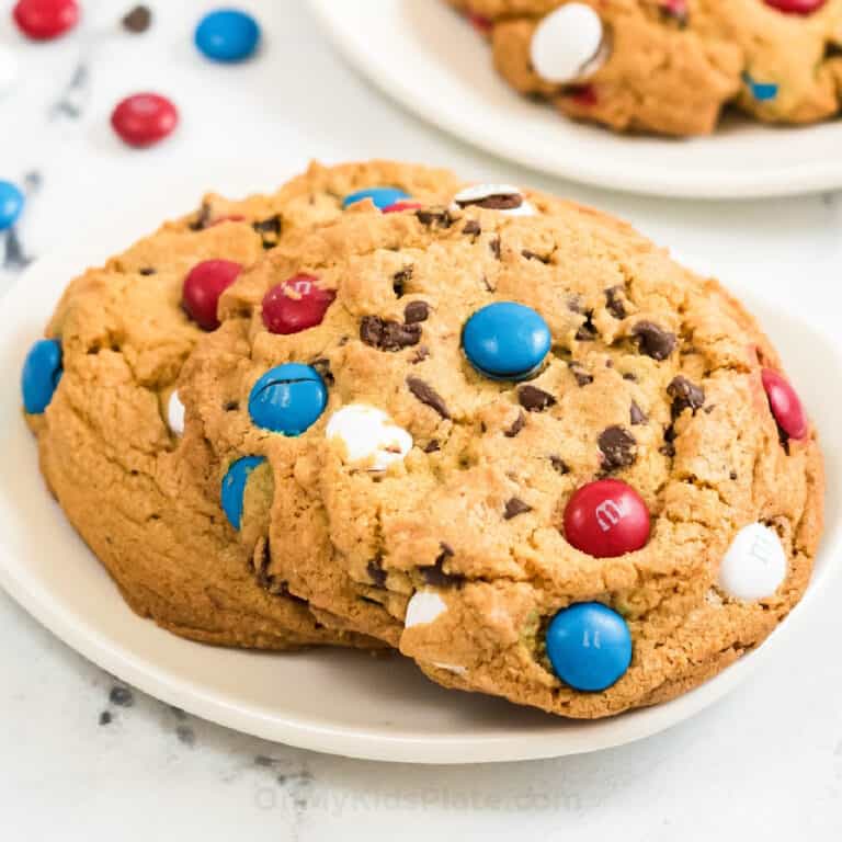 Cookies on a plate with red white and blue M&Ms