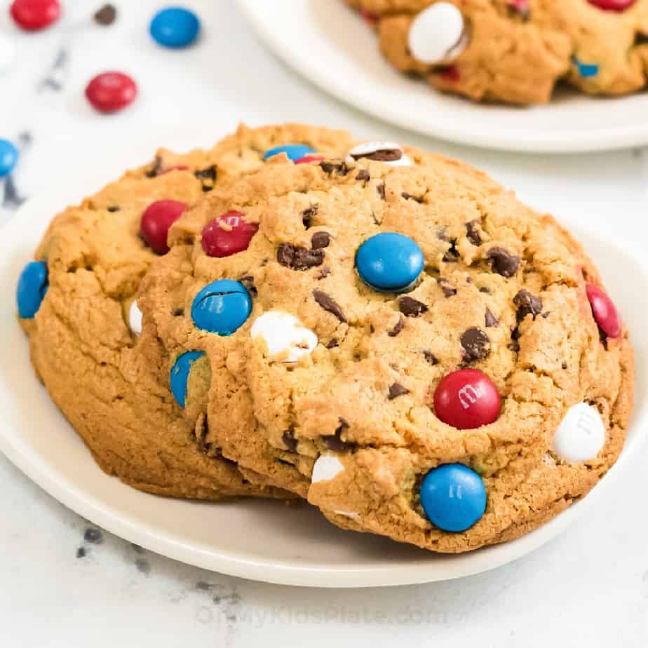 Cookies on a plate with red white and blue M&Ms