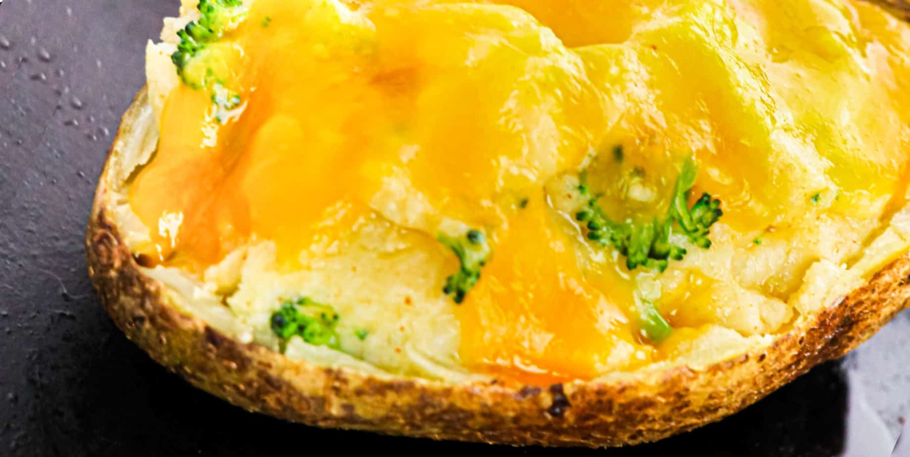 Cheese and broccoli stuffed potato up close