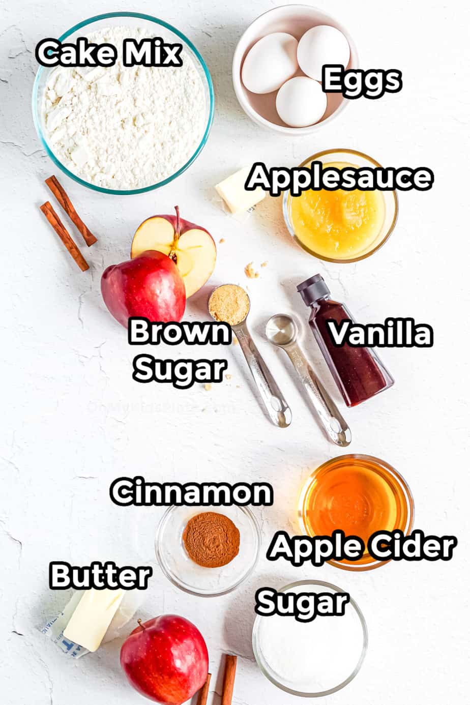 Ingredients for apple cider doughnut cake labeled.