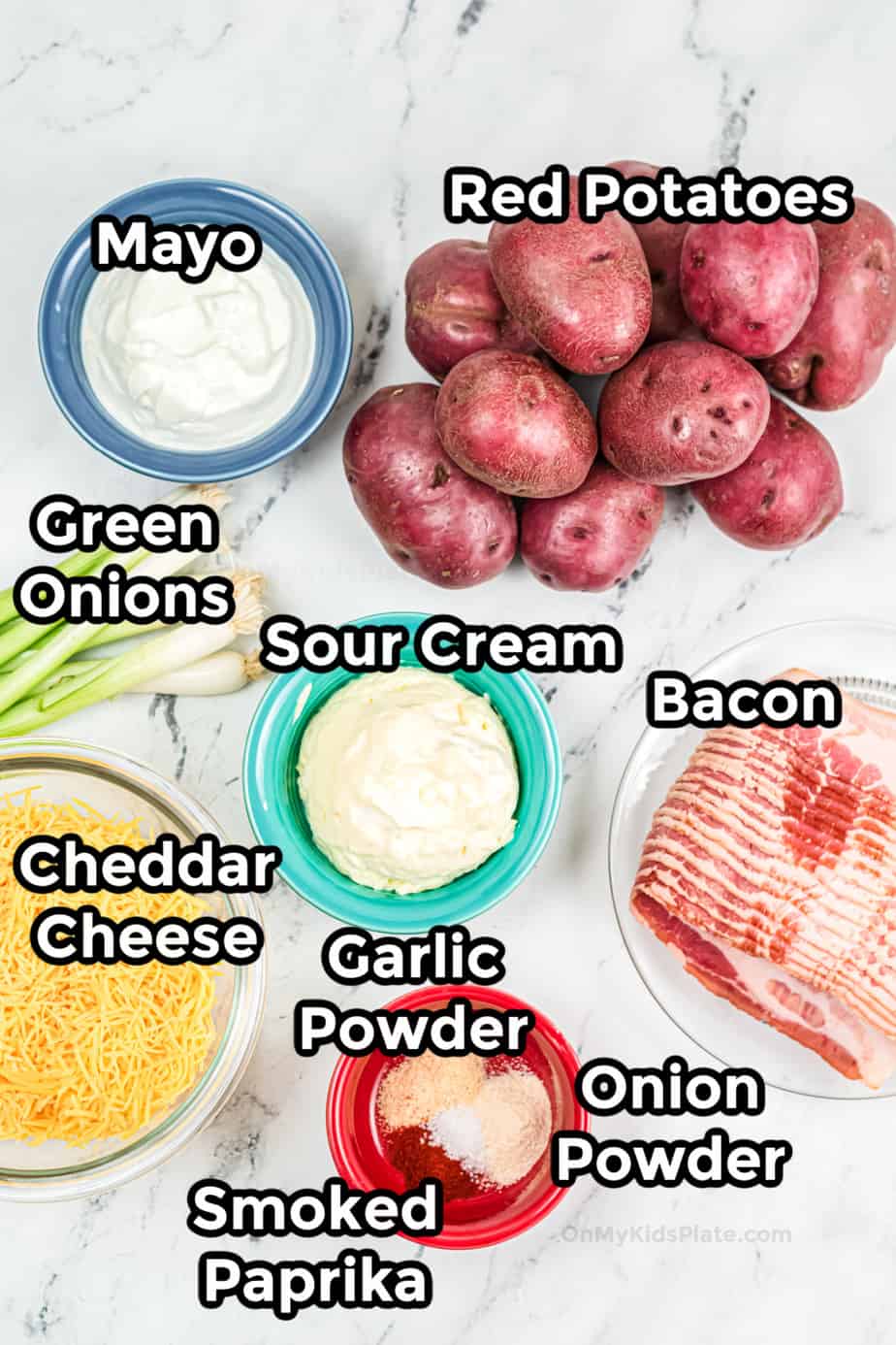 Ingredients for loaded potato salad in bowls.