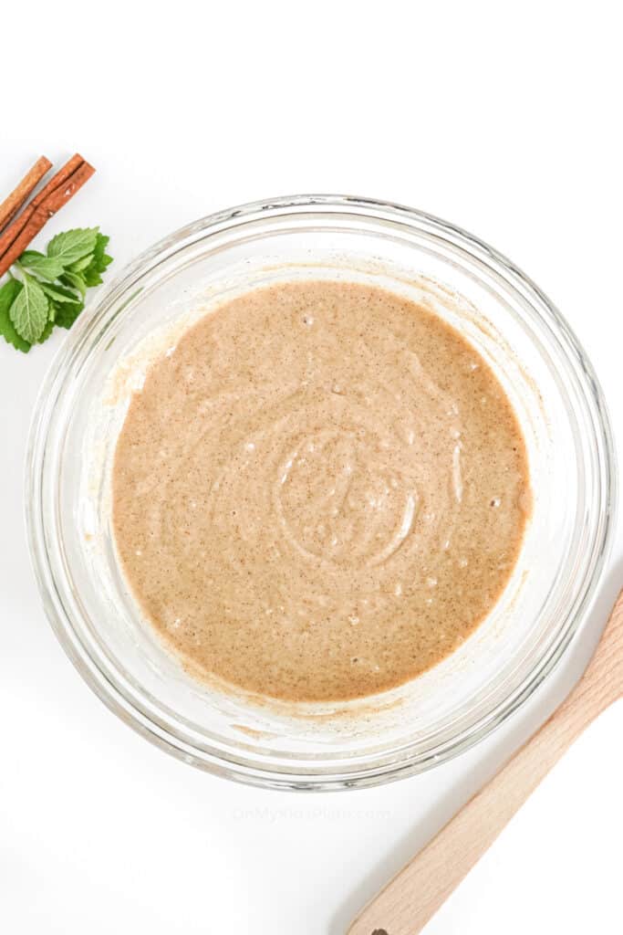 Batter for apple cider donuts after mixing in a large bowl.