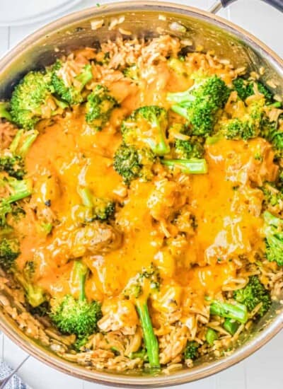 Cheesy chicken broccoli rice dish in deep skillet