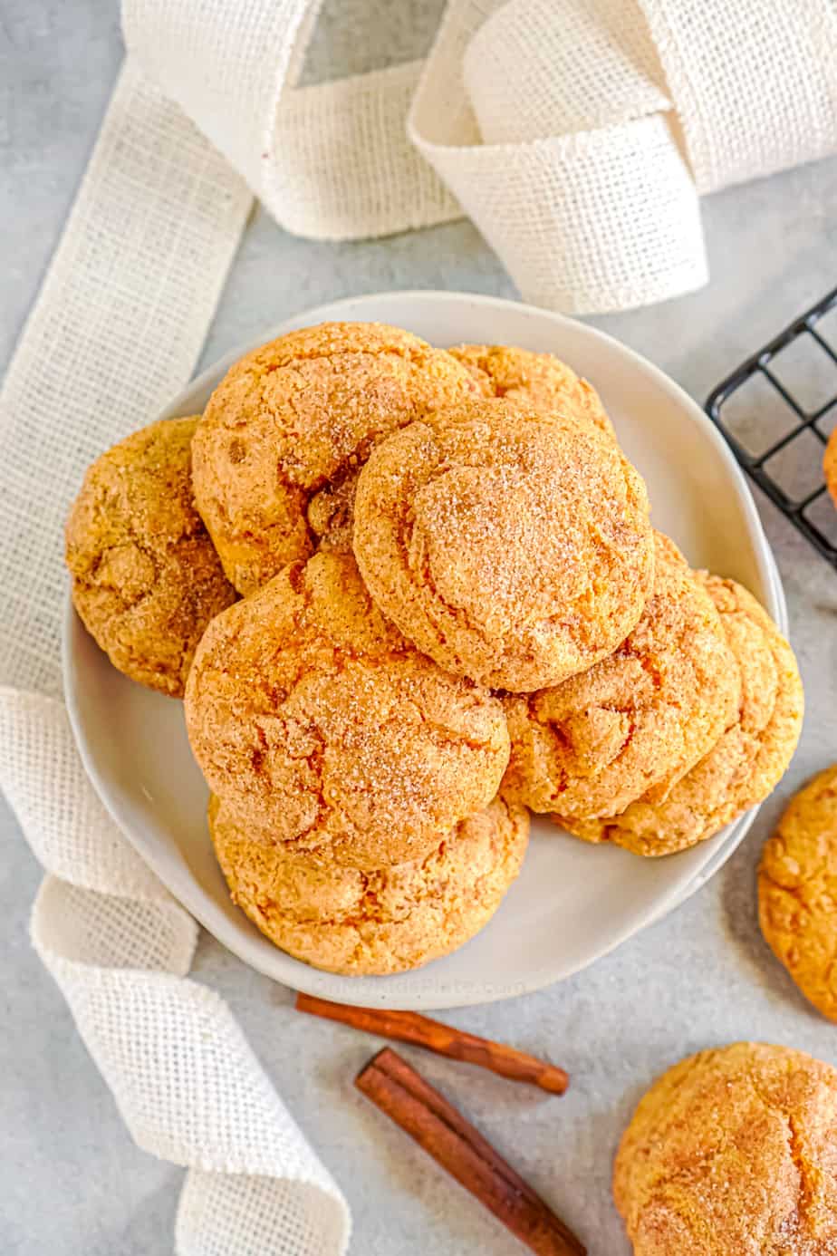 Pumpkin snickerdoodle cookies on a plate