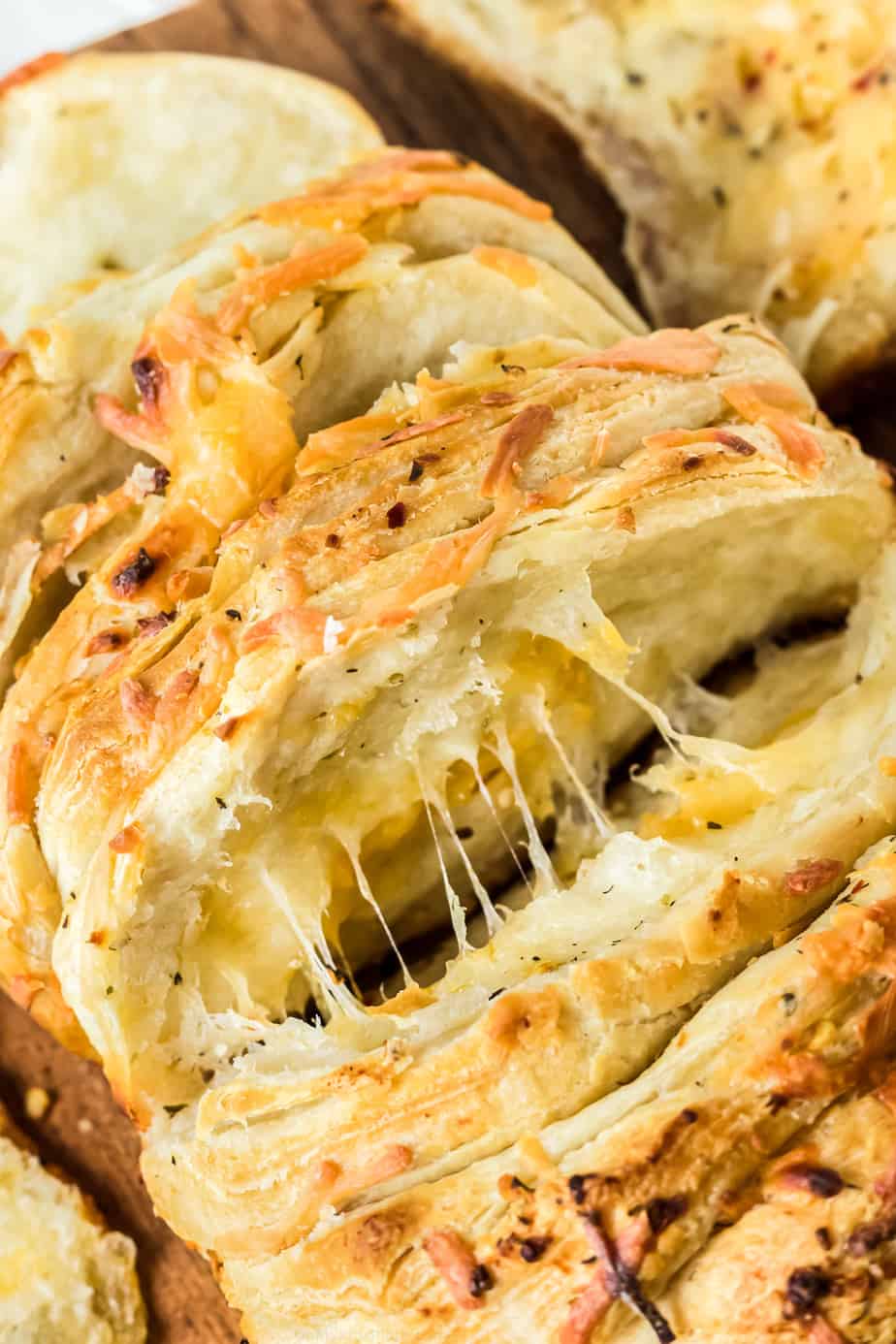 Close up of cheesy pull apart bread layers