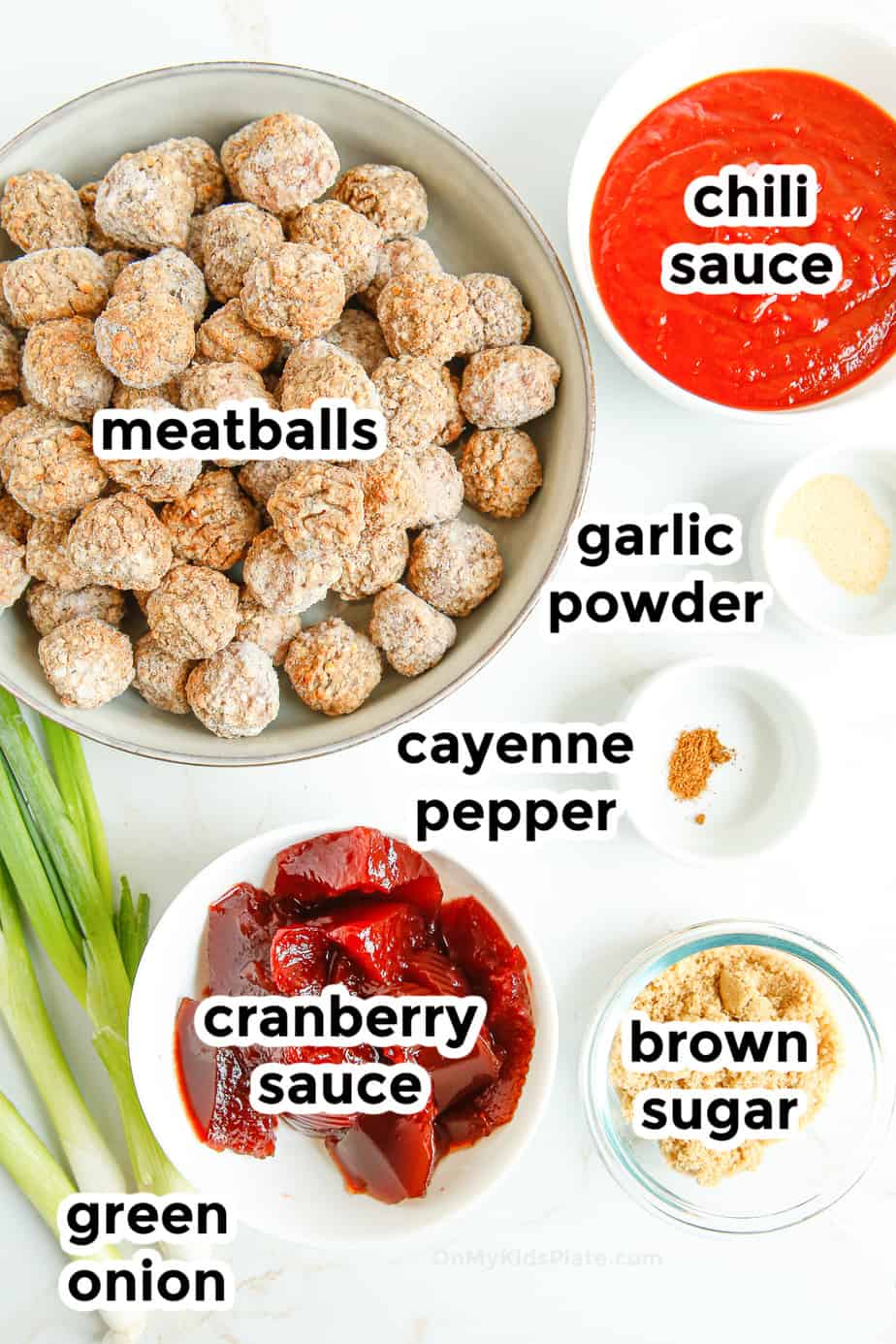 Ingredients for cranberry meatballs labeled in bowls