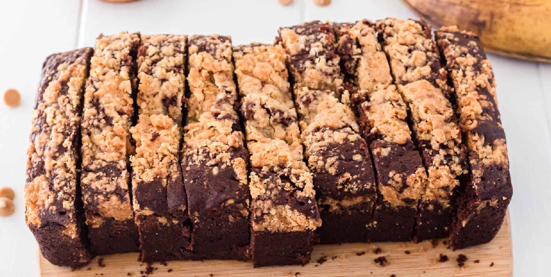 Chocolate peanut butter bread sliced on a cutting board wide view