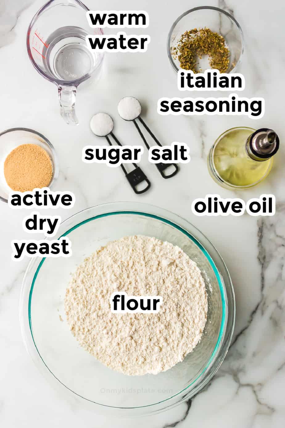 Ingredients for pizza dough in bowls with labels