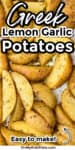 Close up of greek potatoes on a pan with title text overlay