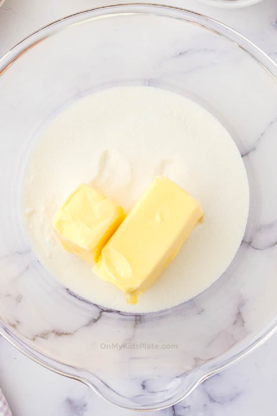 Softened butter and sugar in a large mixing bowl