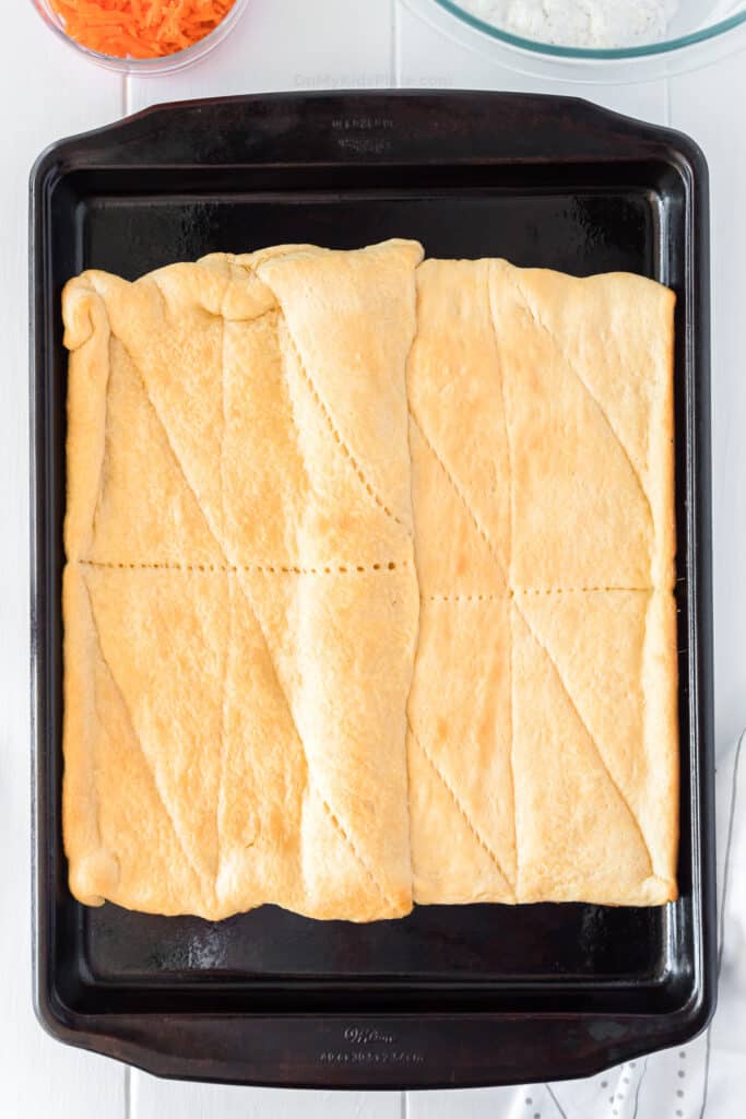 Crescent dough stretched on a pan after baking