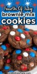Close up of a brownie mix cookie with red white and blue MMS and a title text overlay on the top with sparklers at the edges.