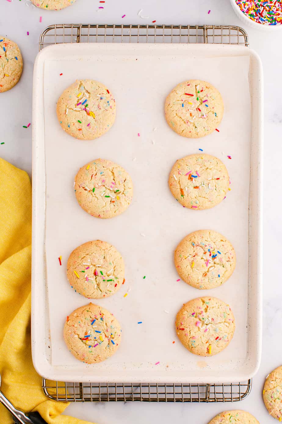 Funfetti cake mix cookies on the pan from above baked on the cookie sheet.