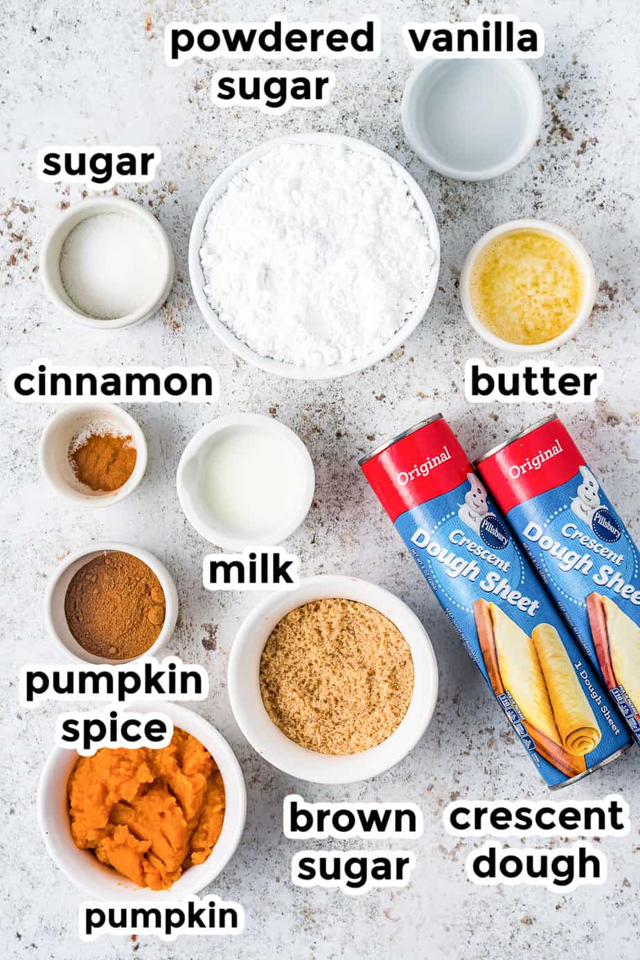 Ingredients for pumpkin pie crescent roll twists in bowls with labels.