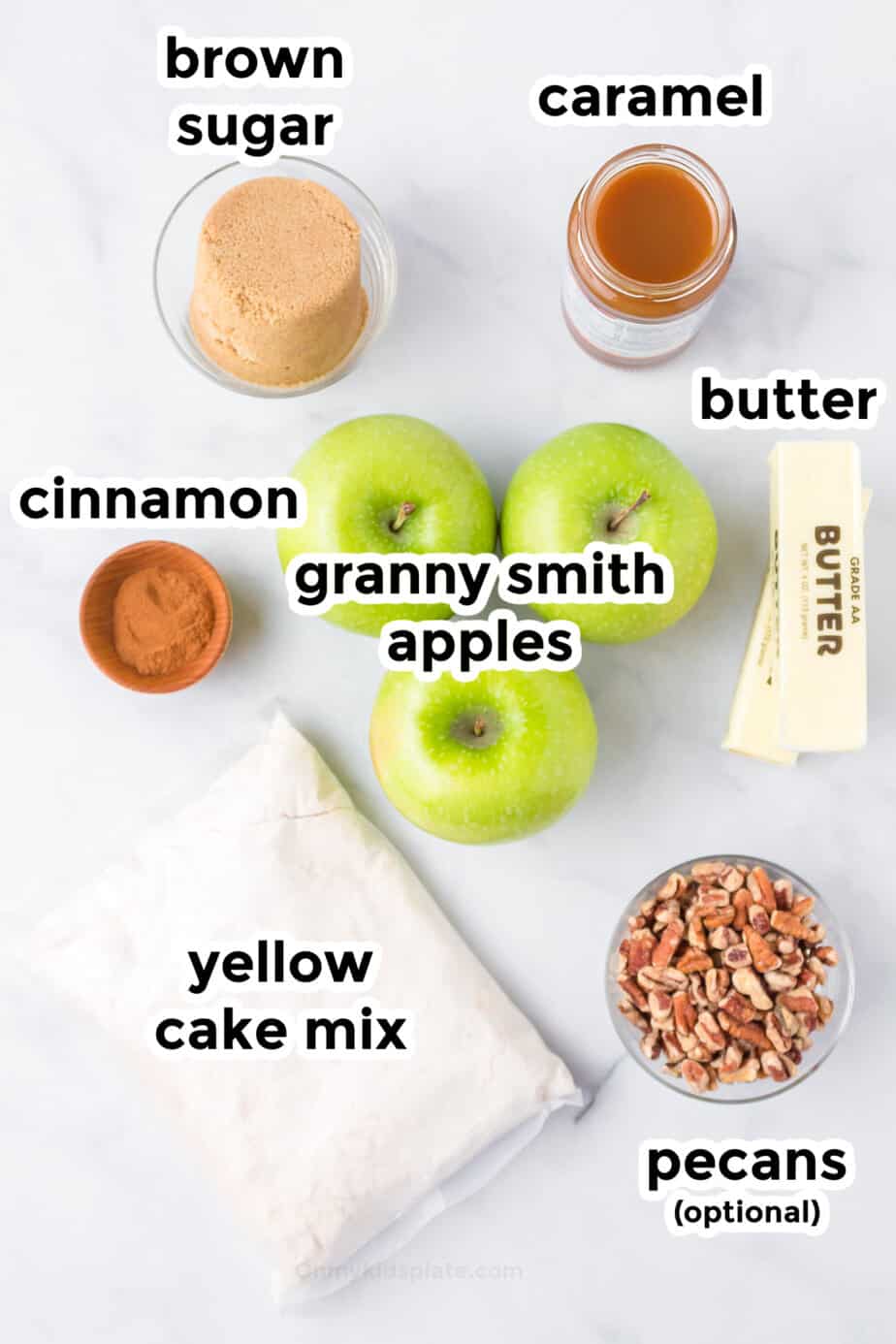 Ingredients for apple caramel dump cake on a counter with labels.