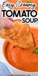 Tall close up view of a grilled cheese sandwich being dipped into a bowl of creamy tomato soup with title text overlay on top of the image.