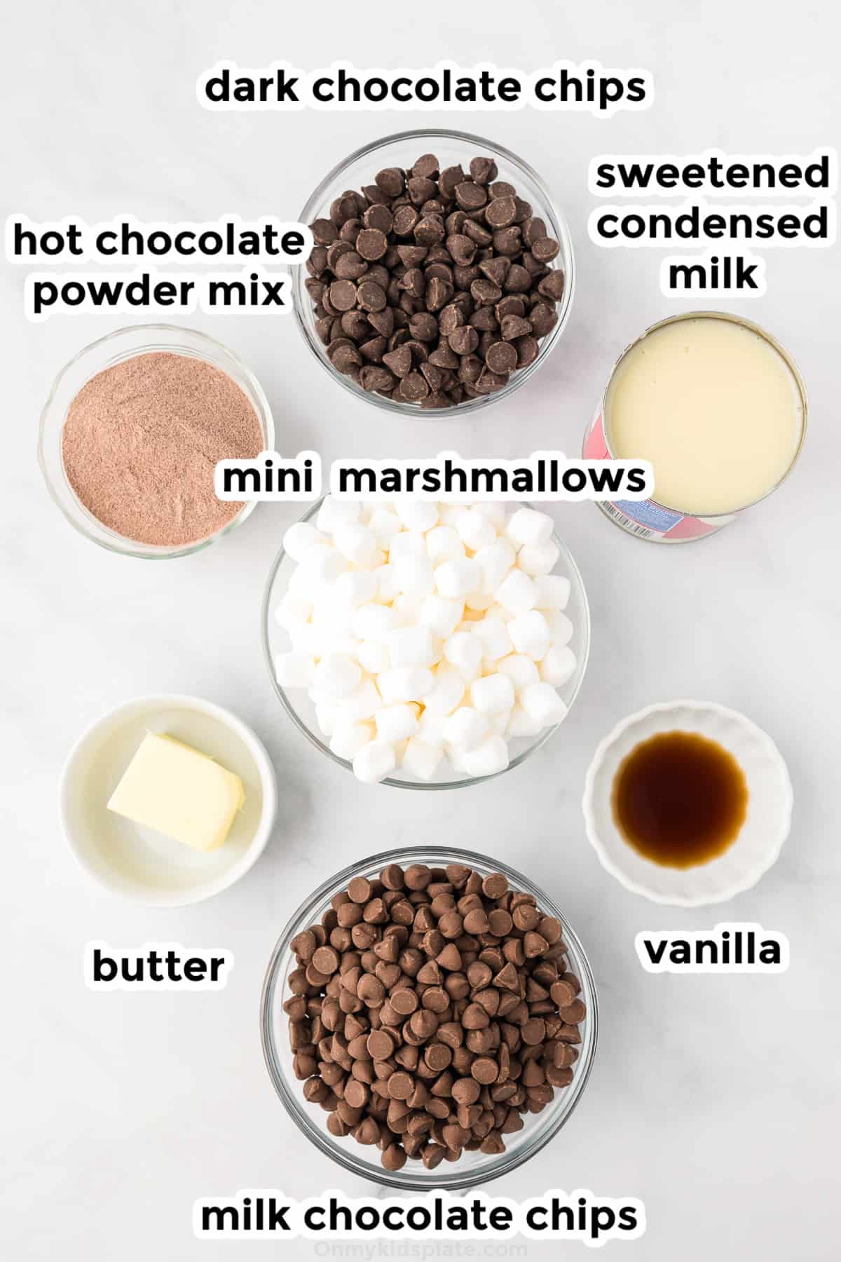 Hot chocolate fudge ingredients in bowls from overhead with text labels.