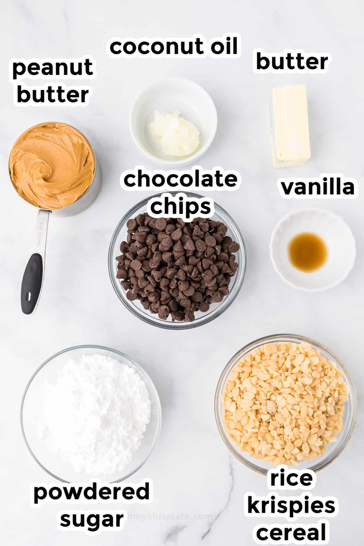 Ingredients for peanut butter balls with rice kripies cereal in bowls on a counter from overhead with text labels.