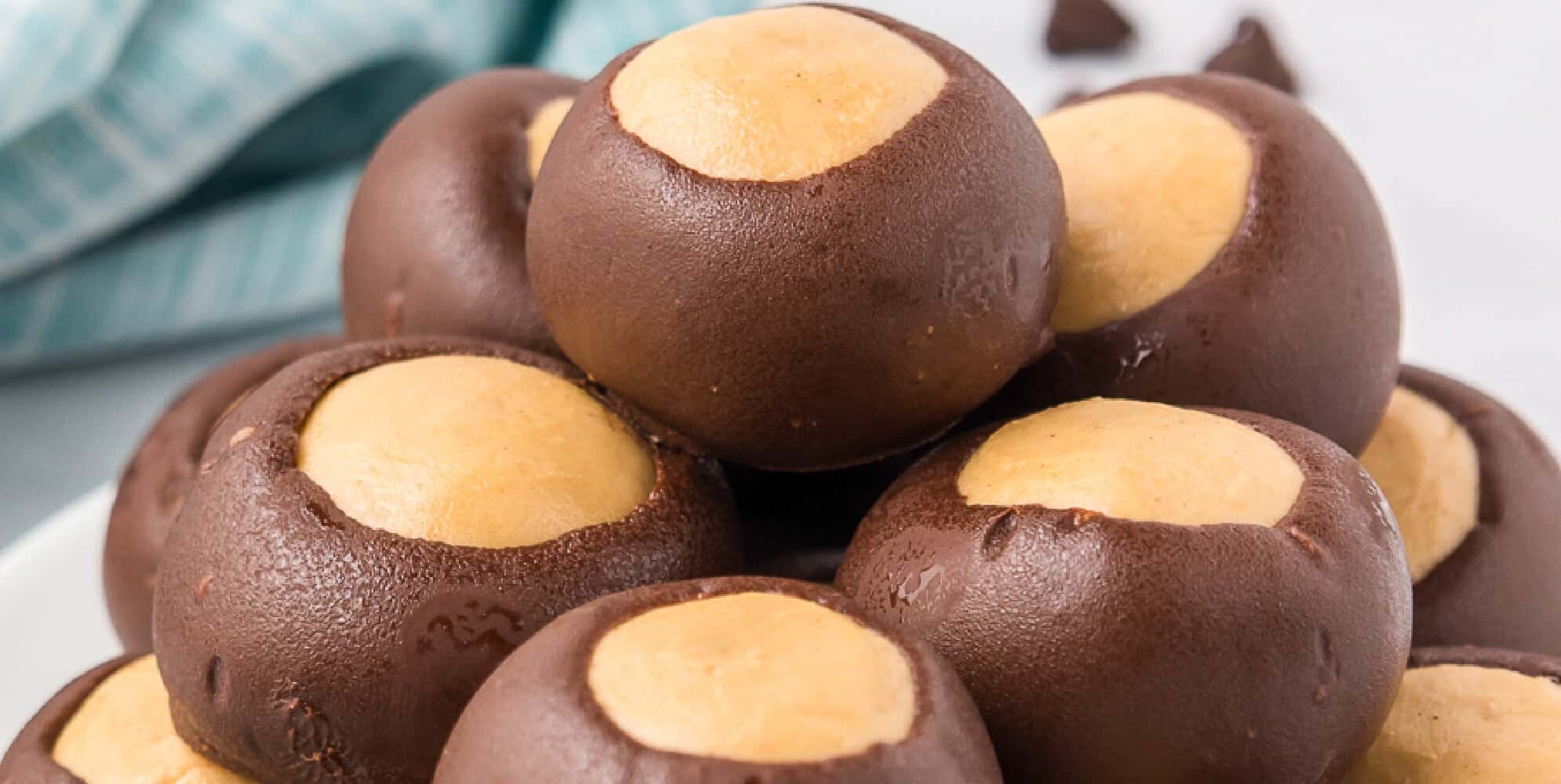 Wide view of buckeyes candies piled high.