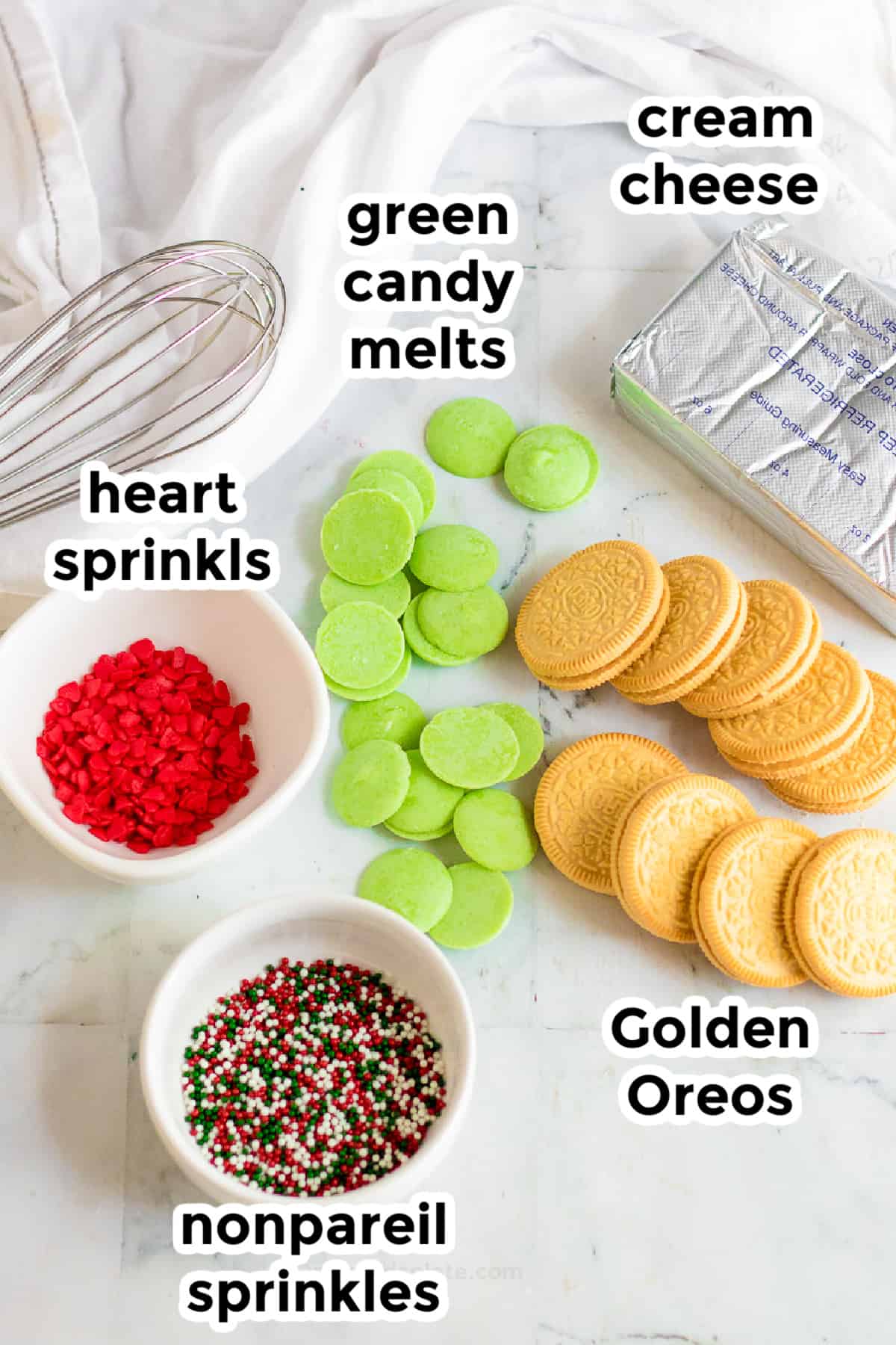 Christmas golden oreo ball ingredients on a counter with title text labels.
