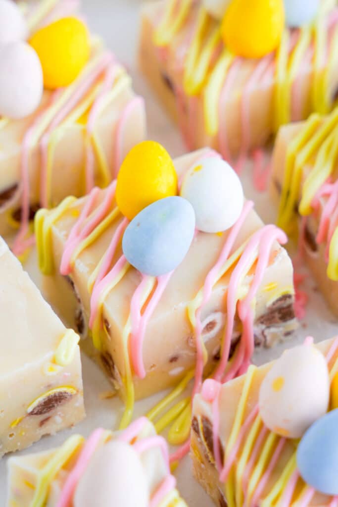 White chocolate fudge pieces topped with chocolate mini eggs.