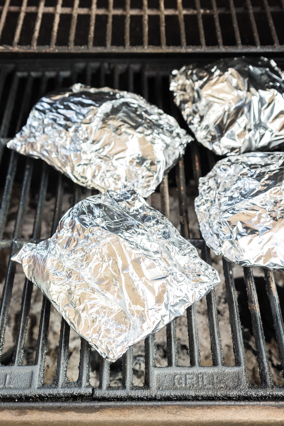 Foil wrapped packets on the grill.