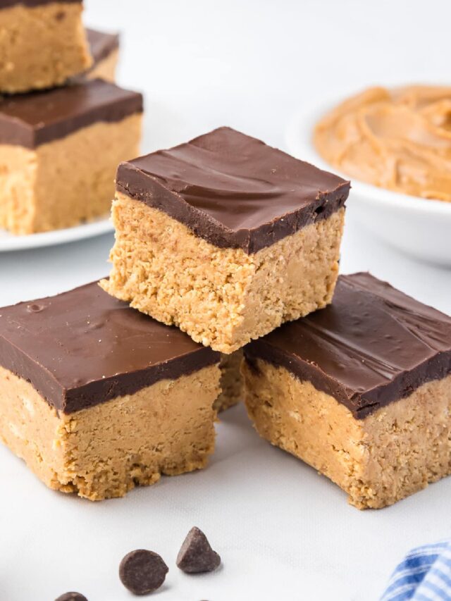 Peanut butter bars stacked on top of each other.